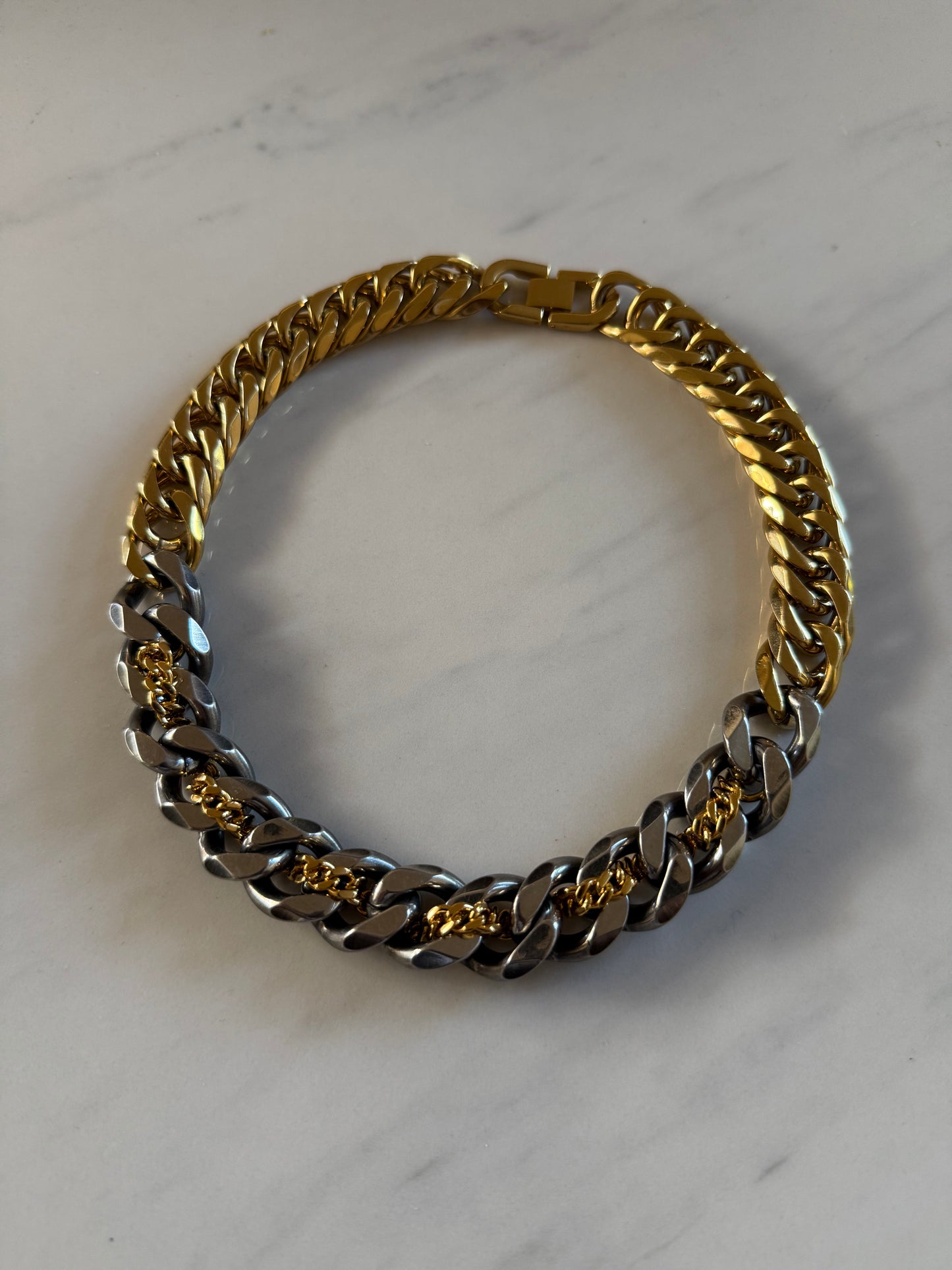 RESTRICTED GOLD