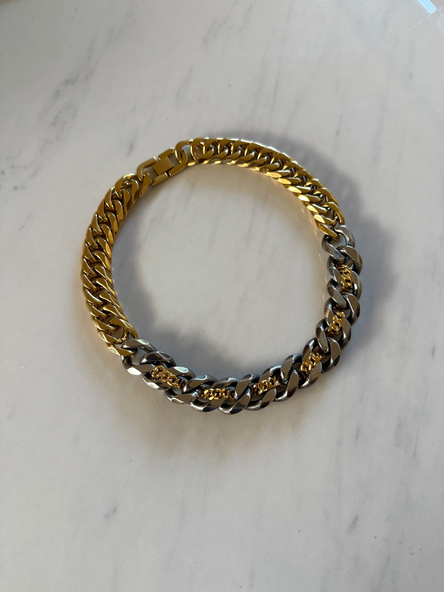 RESTRICTED GOLD