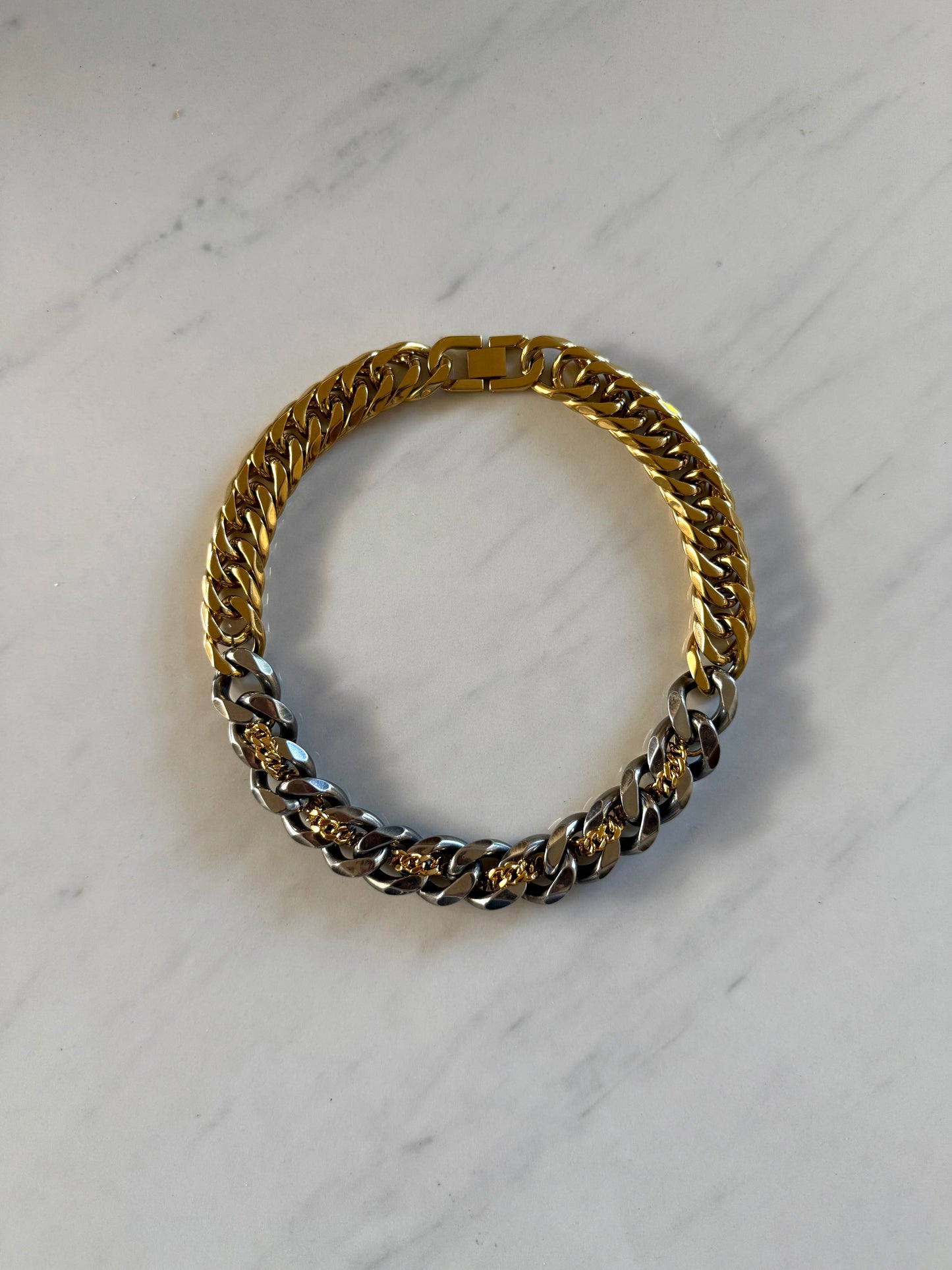 RESTRICTED GOLD